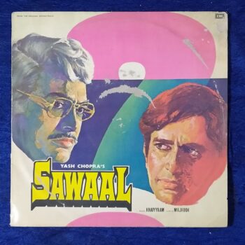 Sawaal - PEASD 2057 -First Pressing - Cover Book Fold - LP Record, Condition - 95% Vikram Mehta alias Vicky is one of two children in the wealthy Mehta family. He has fallen in love with with Reshmi, who is the daughter of Shamsher Singh, his father's business associate, and both would like to get married. Sonia is the second child in the Mehta family, which also consists of Anju, her mom, and dad, Dhanpathrai. While both her mom and dad had agreed in a heartbeat to Reshmi's marriage with Vicky, they show considerable hesitation when Sonia introduces the young man she loves, Ravi Malhotra, who is employed as a Police Inspector. What Sonia does not know is that her dad is criminal don, along with Shamsher Singh, and they will never permit a man who works for the police to become their son-in-law. When Sonia persists, her parents give in, and again Sonia is kept in the dark - for Dhanpathrai has issued instructions to his men to kill Ravi - as he believes this is the only solution that will prevent Sonia from insisting on marrying him. Record Details Title Sawaal - PEASD 2057 Star Cast Shashi Kapoor, Poonam Dhillon, Sanjeev Kumar, Waheeda Rehman, Randhir Kapoor, Swaroop Sampat, Prem Chopra, Ulhas & Helen. Director Ramesh Talwar Producer Yash Chopra Music Khayyam Lyrics Majrooh Sultanpuri Releasing Year 1982 Genre Original Soundtrack Language Hindi Label HMV Made In India Manufacture The Gramophone Company Of India Limited Serial No. PEASD 2057 Side One Sab Ki Nigah Men Sawaal Hai Asha Bhosle Zindagi Haseen Hai (Part - 1 & 2) Kishore Kumar & Chorus Dilruba Hoon Dilruba Asha Bhosle Ab Jaan Rahe Ye Jaye Lata Mangeshkar & Nitin Mukesh Side Two Yeh Safar Lata Mangeshkar & Anwar Maana Churaoge Badan Asha Bhosle, Kishore Kumar & Chorus Idhar Aa Sitamgar Jagjit Kaur & Pamela Chopra Sab Ki Nigah Men Sawaal Hai Asha Bhosle Specification Size 12 Inches Speed 33 RPM Record Condition - 95% Cover Condition - As Per Photo