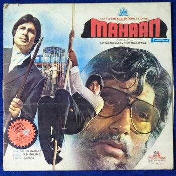 Mahaan - 2392 373 - Cover Book Fold -(First Pressing) - LP Record, Condition - 90%, Cover - Original - Vikram (Amjad Khan) is arrested for possession of drugs, but claims that he was framed by Rajan (Sujit Kumar), his associate, but no one believes him. Desperately he turns to his lawyer friend, Vikram, only to have himself prosecuted at his very hands. Vikram gets sentenced, and upon his release goes to Amit and asks him to negotiate to get him his share of their former business from Rajan. Amit agrees to do so, but the negotiation gets bitter, argument ensues, followed by fisticuffs and use of firearms, which lead to the death of Rajan. It is now Amit's turn to be on the run from the law, as his pleas that he acted in self-defense are ignored, and there is no one to turn to for help. Amit's pregnant wife, Janki, asks him to run away somewhere safe, while she re-locates to another city until his file is closed or set aside. Amit runs to nearby Nepal, while Janki gives birth to twins. Record Details Title - Mahaan - 2392 373 Star Cast - Ashok Kumar, Waheeda Rehman, Amitabh Bachchan, Zeenat Aman, Parveen Babi, Amjad Khan, Kader Khan, Aruna Irani, Shakti Kapoor, Sujit Kumar, Mac Mohan & Mukri. Director - S. Ramanathan Producer - Satyanarayana & Suryanarayana Singer - Rahul Dev Burman, Asha Bhosle, Kishore Kumar, Amit Kumar & Amitabh Bachchan Music - Rahul Dev Burman Lyrics - Anjaan Releasing Year - 1982 Genre - Original Soundtrack Language - Hindi Label - Music India Made In India Manufacture - Music India Ltd. Serial No. - 2392 373 Side One Ye Din To Aata Hai Rahul Dev Burman, Asha Bhosle & Chorus Jidhar Dekhoon Kishore Kumar Asli Kya Hai Kishore Kumar & Amit Kumar Aadhi Baat Ho Chukhi Kishore Kumar Side Two Pyar Mein Dil Pe Maar De Goli Kishore Kumar & Asha Bhosle Jidhar Dekhoon Amitabh Bachchan Har Gori Rani Yahan Kishore Kumar Specification Size - 12 Inches Speed - 33 RPM Record Condition - 90% Cover Condition - Excellent