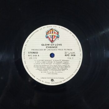 Change - The Glow Of Love - RFC 3438 - LP Record, Condition - 90% - Change was an Italian-American post-disco group formed in Bologna, Italy in 1979 by businessman and executive producer Jacques Fred Petrus (1949–1986) and Mauro Malavasi (1957). They were heavily influenced by legendary disco band Chic. The band's debut album, The Glow of Love, was released in 1980. It was composed by a small team of writers made up of Romani, Malavasi, Paolo Gianolio (lead guitarist), Tanyayette Willoughby, Paul Slade and Wayne Garfield. The first single was the million seller "A Lover's Holiday" featuring the ad lib stylings of Zachary Sanders, known then for his work on Schoolhouse Rock. The follow-up hits from the album, "Searching" and the title song feature lead vocals by Luther Vandross who had yet to come to prominence. The three songs combined set the all-time record, spending nine (9) weeks at #1 on Billboard's Club Play Singles chart. Record Details Title Change - The Glow Of Love - RFC 3438 Artist Change Producer Jacques Fred Petrus & mario Malavasi Lyrics W. Garfield, P. Slade & T. Willoughby Genre Private Songs Releasing Year 1980 Language English Label WB Records Made In India Manufacturer The Gramophone Co. Of India Ltd. Serial No. RFC 3438 Side One A Lover's Holiday It's A Girl's Affair Angel In My Pocket Side Two The Glow Of Love Searching The End Specification Size 12 Inches Speed 33 RPM Record Condition - 90%