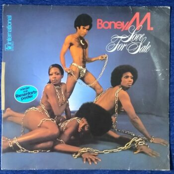 Boney M - Love For Sale - 28 888 OT - LP Vinyl Record, Condition - 90%, Cover - Original - - Love for Sale is the second studio album by Euro-Caribbean group Boney M. The album includes the hits "Ma Baker" (#96 on the Billboard Hot 100, #31 on the Club Play Singles chart), and "Belfast". It also includes covers: "Love for Sale" (by Cole Porter), "Have You Ever Seen the Rain?" (by Creedence Clearwater Revival), and "Still I'm Sad" (by The Yardbirds). It has been released in vinyl and then CD. The standard cover art features the male member Bobby Farrell "naked [with] a futuristic golden thong"chaining female members, resembling African sexual slaves. American label Atlantic Records found the cover "raunchy",so they used the standard back cover of a vinyl sleeve featuring the band wearing clothes as the alternative front cover of American and Canadian edition.One of the female group members, Liz Mitchell, told The Sydney Morning Herald: Record Details Title Boney M. - Love For Sale - 2310 548 Singer Boney M. Lyrics Frank Farian, Fred Jay, George Reyam, Cole Porter, Jimmy Bilsbury, Drafi Deutscher, Joe Menke, John Fogerty, T. King, Liz Mitchell, Keith Forsey, Jim McCarty & Paul Samwell-Smith Producer - Frank Farian Releasing Year - 1977 Genre - Private Songs Language - English Label - Hansa International Manufacture - Hansa International Serial No. 28 888 OT Side One Ma Baker Boney M. Love For Sale Boney M. Belfast Boney M. Have You Ever Seen The Rain Boney M. Gloria, Can You Waddle Boney M. Side Two Plantation Boy Boney M. Motherless Child Boney M. Silent Lover Boney M. A Woman Can Change A Man Boney M. Still I'm Sad Boney M. Specification Size - 12 Inches Speed - 33 RPM Record Condtion - 90% Cover Condition -Excellent