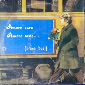 Bruno Lauzi – Amore Caro Amore Bello - Gate Fold Cover - ZDLN 55015 (2) - (2-LP Set) - LP Record, Condition - 95%+(Near Mint), Cover - Original - - Label: Numero Uno – ZDLN 55015 (2) Format: 2 x Vinyl, LP, Album, Gatefold Country: Italy Released: 1971 Genre: Pop, Folk, World, & Country Style: Chanson A1 Amore Caro, Amore Bello Written-By – Battisti*, Mogol A2 Al Mercato Dei Fiori Written-By – B. Lauzi*, A.&C. La Bionda* A3 4.000.000 Di Anni Fa Written-By – B. Lauzi*, A.&C. La Bionda* A4 Lei Non È Qui, Non È Là Written-By – B. Lauzi*, E. Bennato* A5 Il Costruttore Written-By – B. Lauzi* A6 Giovedì Speciale Written-By – B. Lauzi*, T. Fontana* B1 L'Aquila Written-By – Battisti*, Mogol B2 Un Buon Matrimonio Written-By – B. Lauzi*, P. Donaggio* B3 Il Coniglio Rosa Written-By – B. Lauzi*, A.&C. La Bionda* B4 Stella, Stella Written-By – B. Lauzi*, M. Salerno* B5 Devo Assolutamente Sapere Written-By – B. Lauzi* B6 Il Tuo Amore Written-By – B. Lauzi* From The Recital At "Teatro Filodrammatico", Milano C1 Menica, Menica Written-By – B. Lauzi* C2 Vecchio Paese Written-By – B. Lauzi* C3 La Banda Written-By – B. Lauzi* C4 Gli Acrobati Written-By – B. Lauzi* C5 La Mia Solitudine (Ma Solitude) Written-By – B. Lauzi*, G. Moustaki* D1 O Frigideiro Written-By – B. Lauzi*, G. F. Reverberi*, G. Calabrese* D2 Il Tuo Amore Written-By – B. Lauzi* D3 Ritornerai Written-By – B. Lauzi* D4 When I Meet Connie In The Cornfield Written By – Cots Written-By – Davies* D5 Coccodì, Coccodà Written-By – Celso, Valdi Cover Condition - As Per Photo.